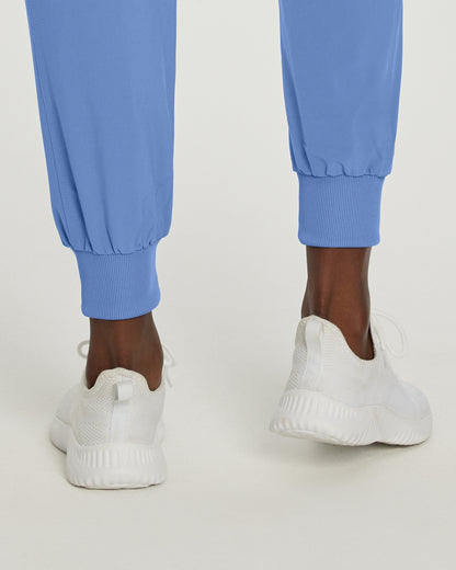 Pantalones de trabajo con cintura elástica y corte cruzado en color blanco