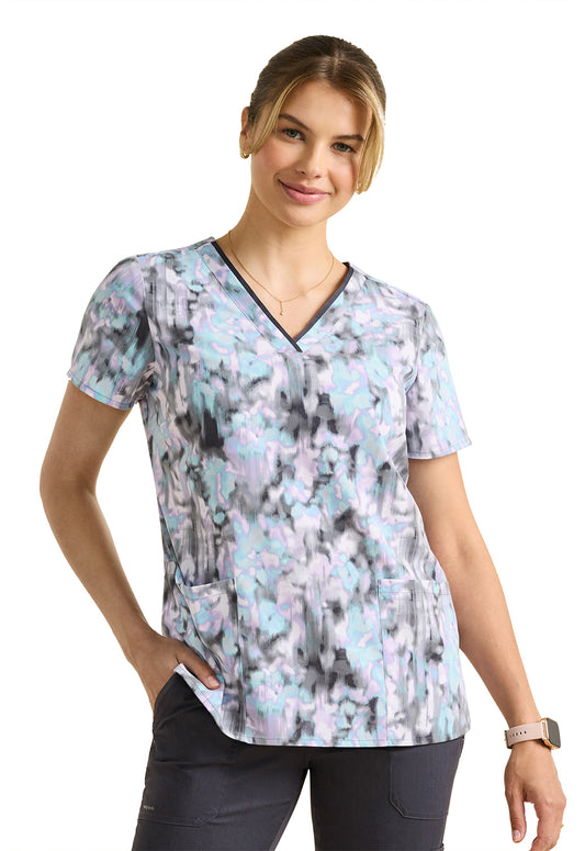 Blusa médica Amanda con estampado de flujo de color y etiqueta morada de Healing Hands